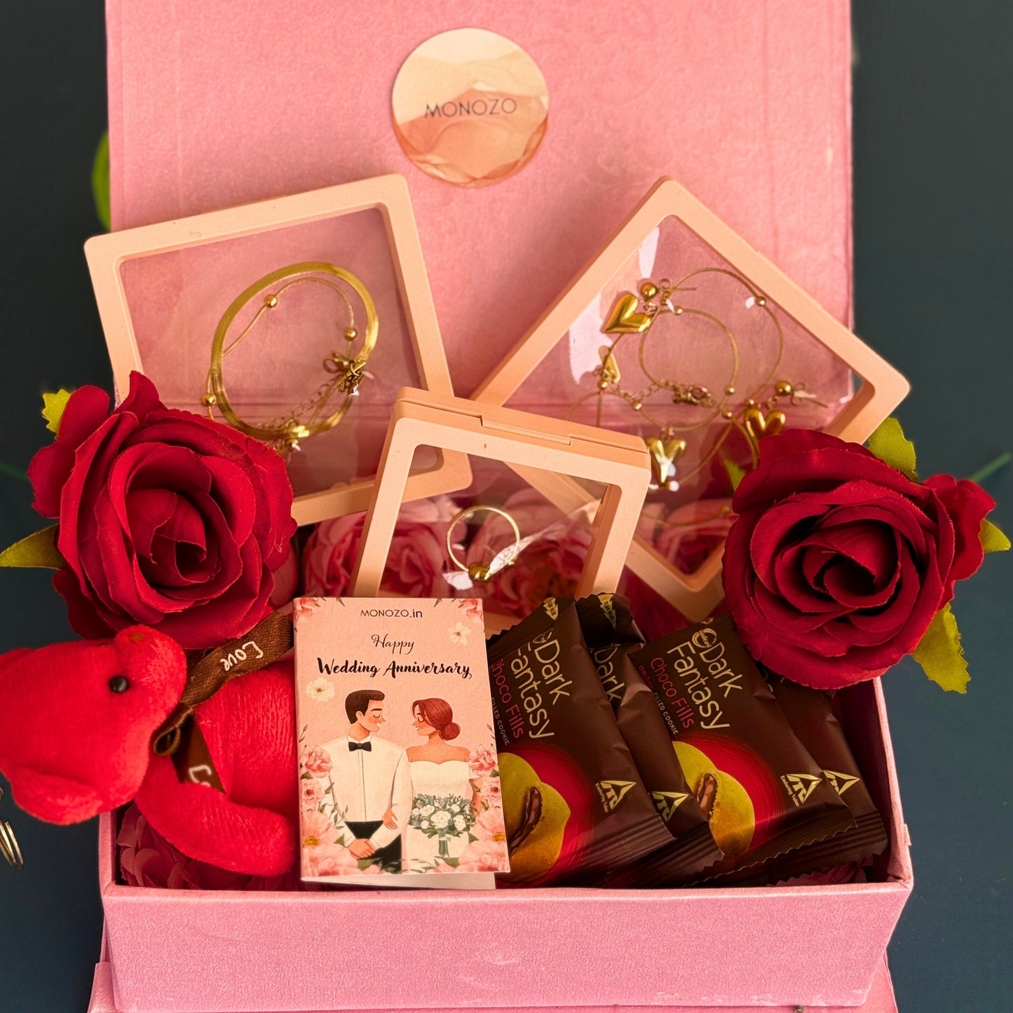 Anniversary Gift Hamper (4 Jewellery Sets, 1 Teddy Key Ring, Choco Cookies, 2 Roses, Anniversary Wish Card)