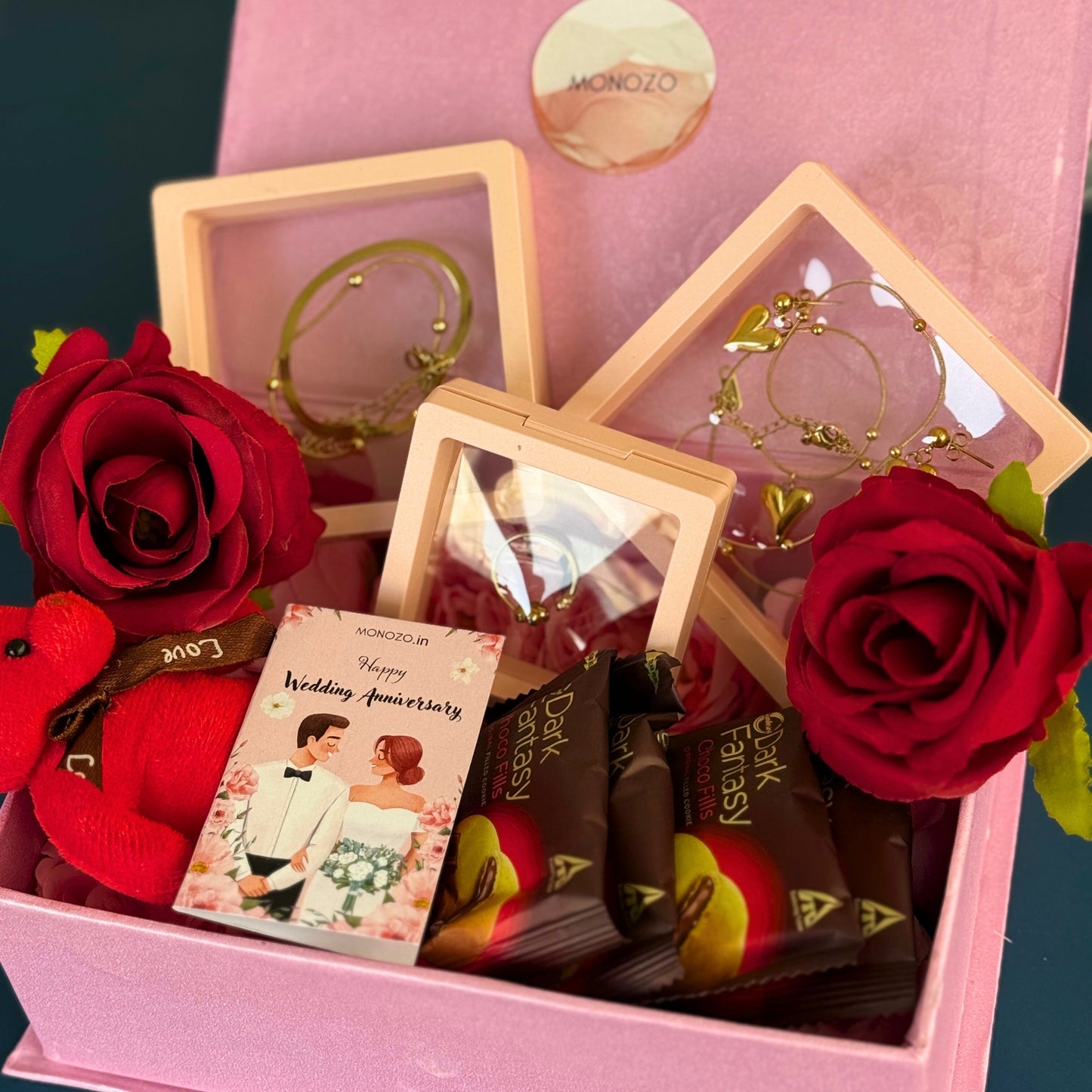 Anniversary Gift Hamper (4 Jewellery Sets, 1 Teddy Key Ring, Choco Cookies, 2 Roses, Anniversary Wish Card)