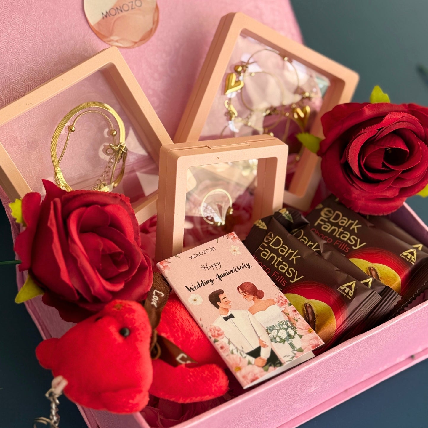 Anniversary Gift Hamper (4 Jewellery Sets, 1 Teddy Key Ring, Choco Cookies, 2 Roses, Anniversary Wish Card)