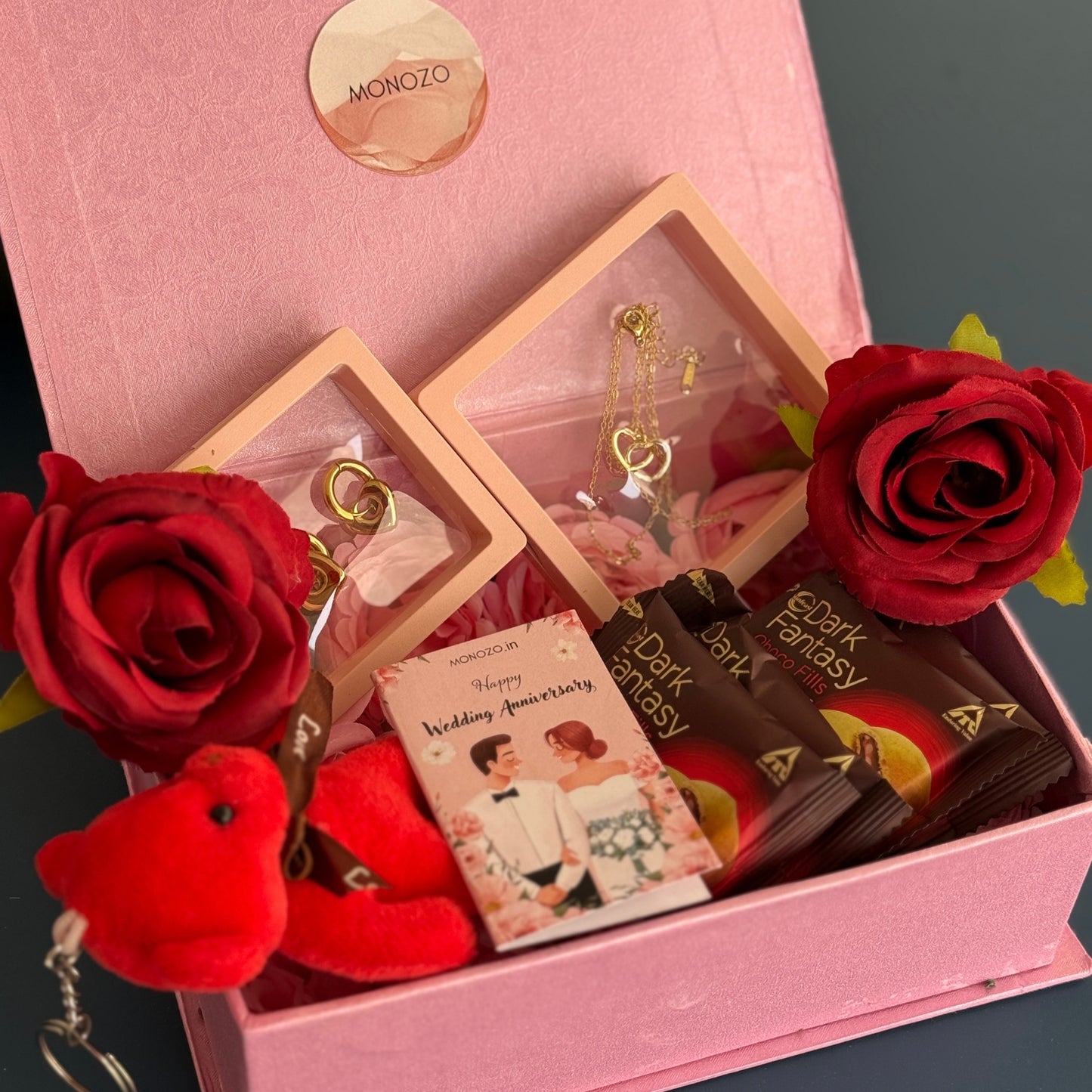Anniversary Gift Hamper (2 Jewellery Sets, 1 Teddy Key Ring, Choco Cookies, 2 Roses, Anniversary Wish Card)